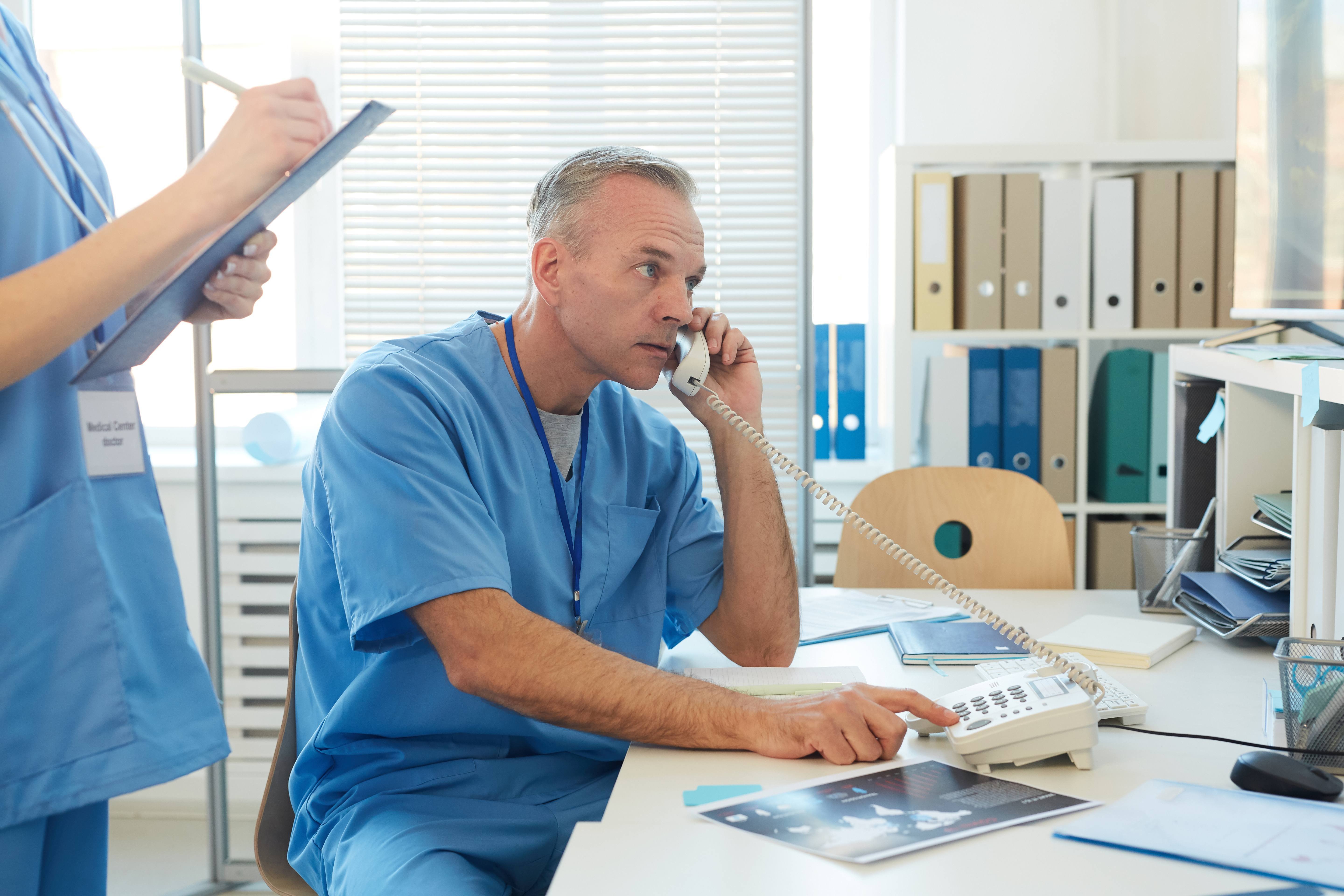 a doctor using phone interpretation services